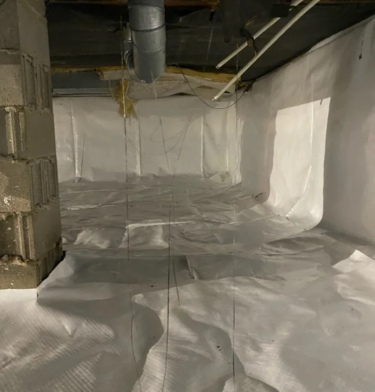 Dampness in crawl space causes mold, musty odors, and structural damage. Learn what drives crawl space moisture problems and how to fix them permanently.