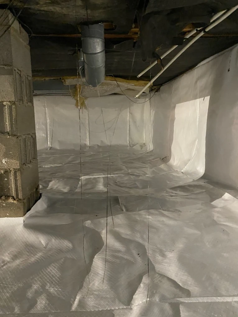 Dampness in crawl space causes mold, musty odors, and structural damage. Learn what drives crawl space moisture problems and how to fix them permanently.